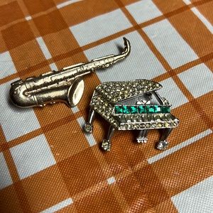 Piano and saxophone pins